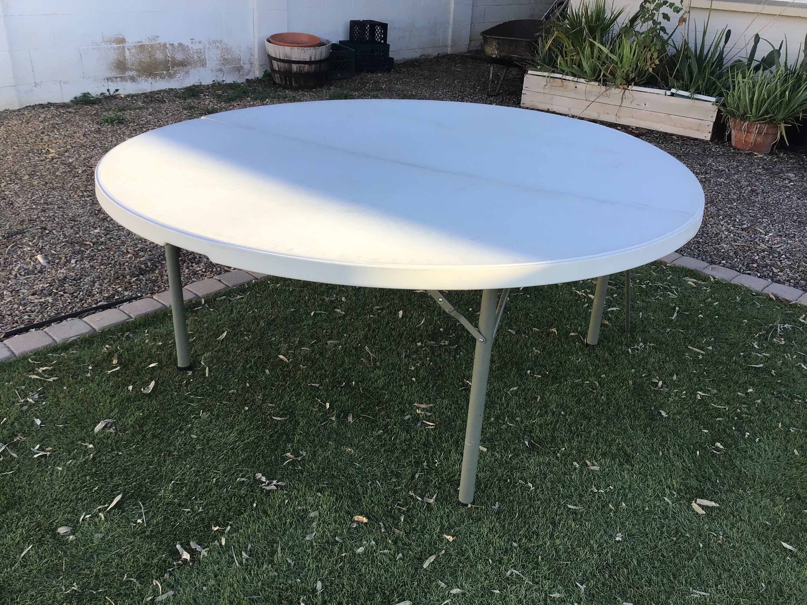 5 foot, 9 inch round tables (bifold)