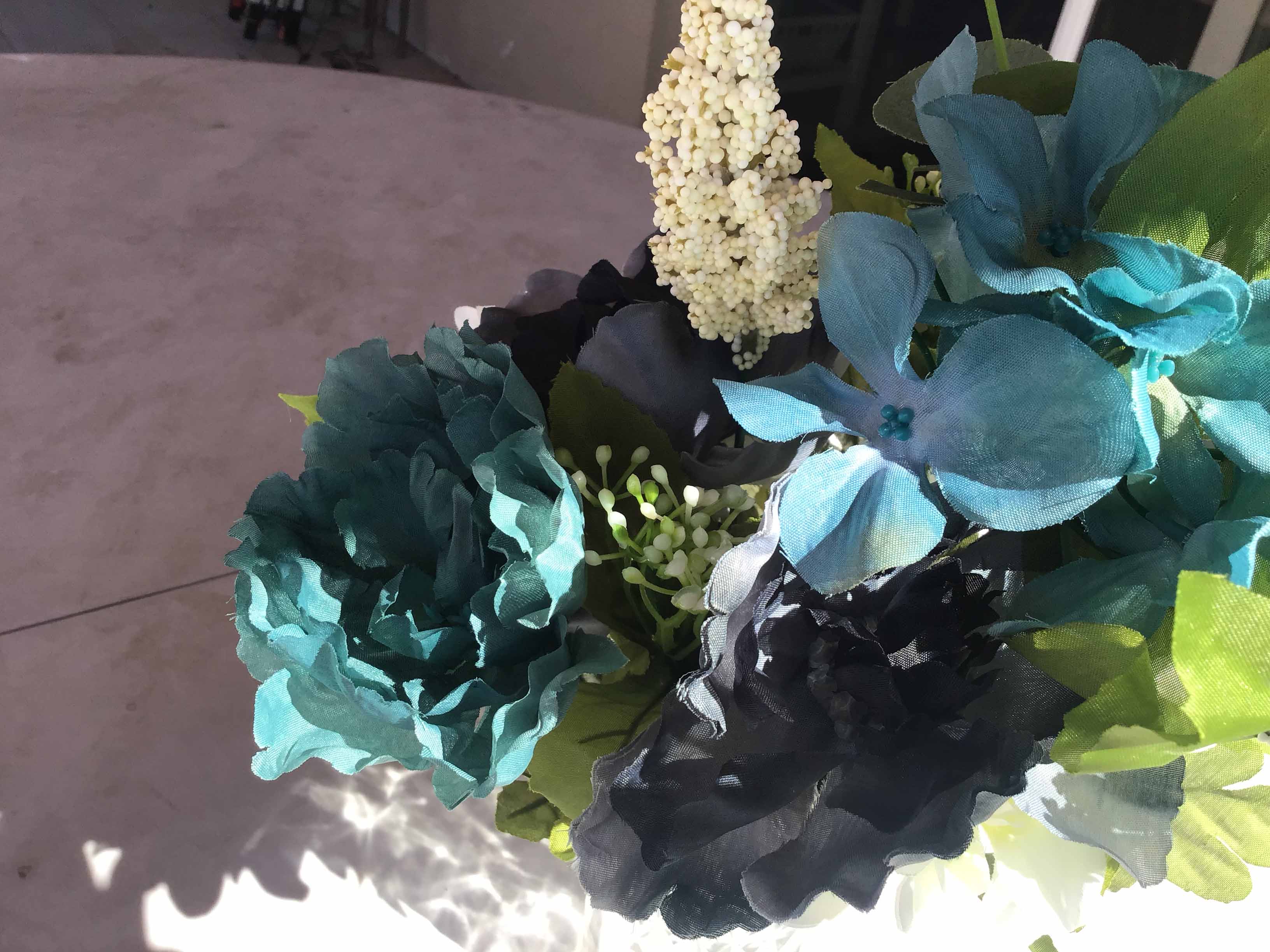 box of plastic/silk flowers