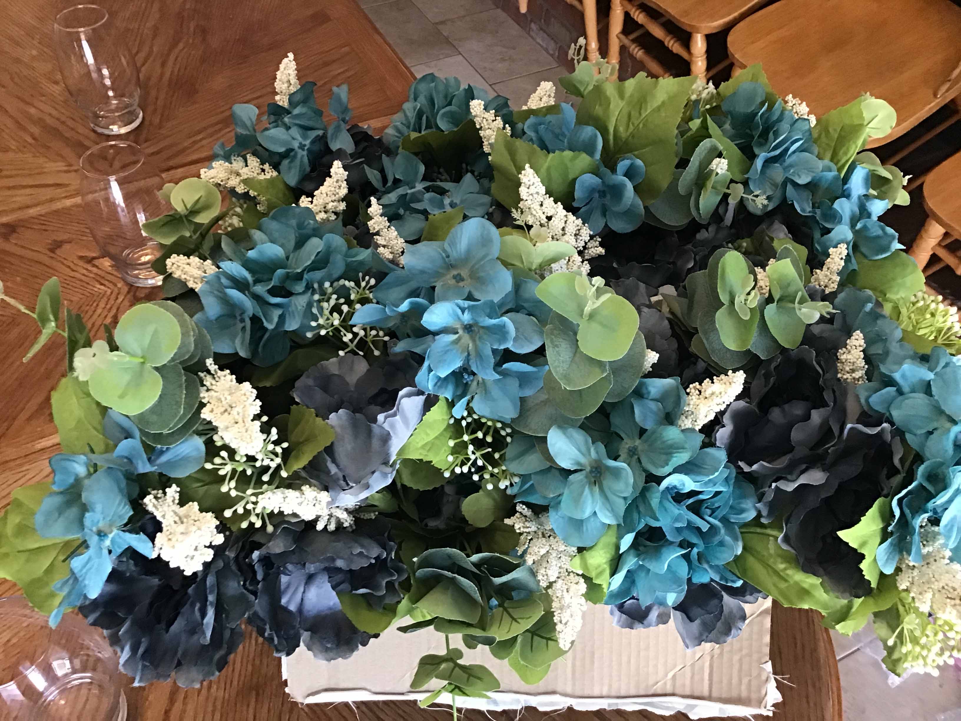 box of plastic/silk flowers