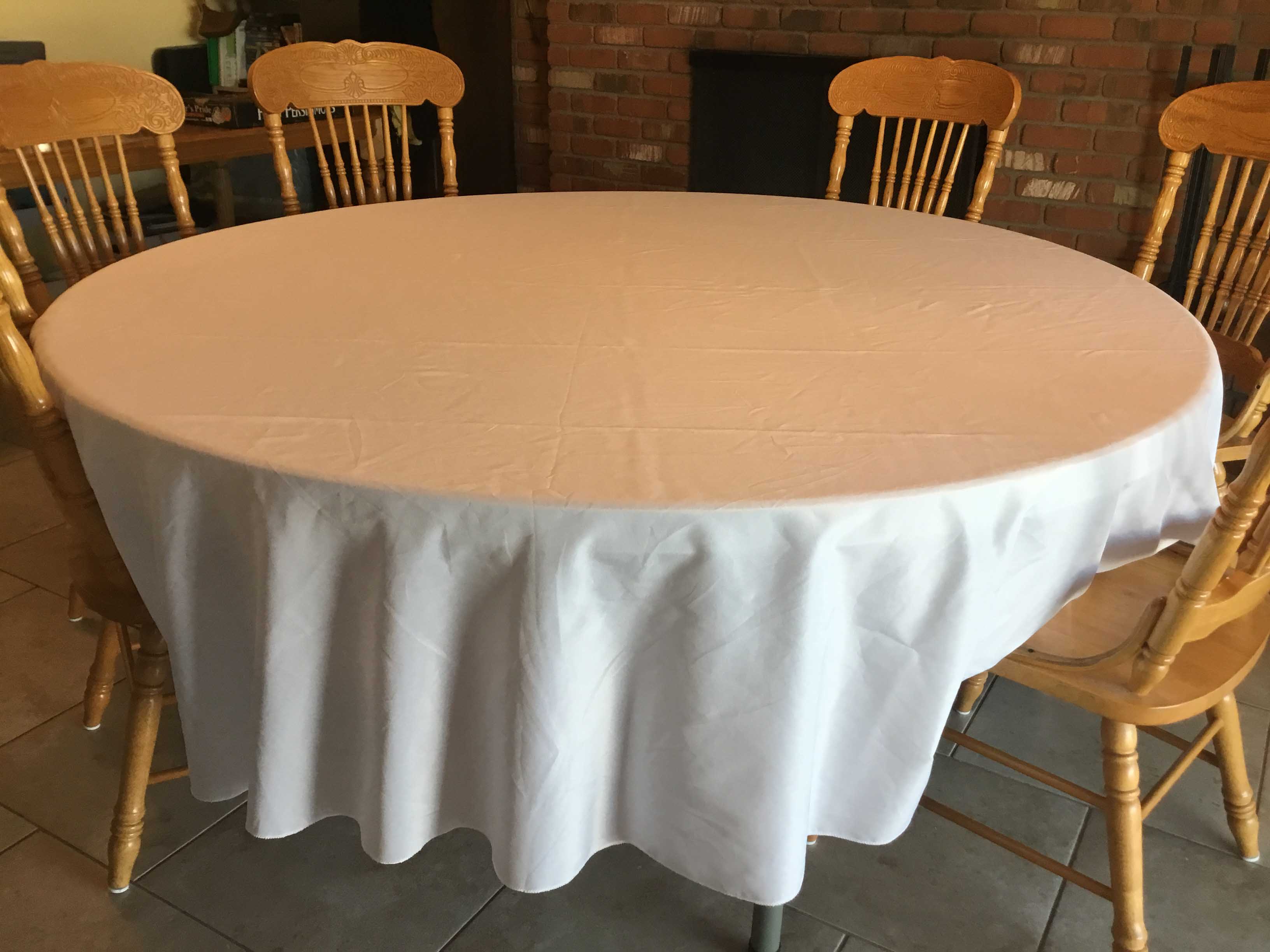 5 foot, 9 inch round tables (bifold)