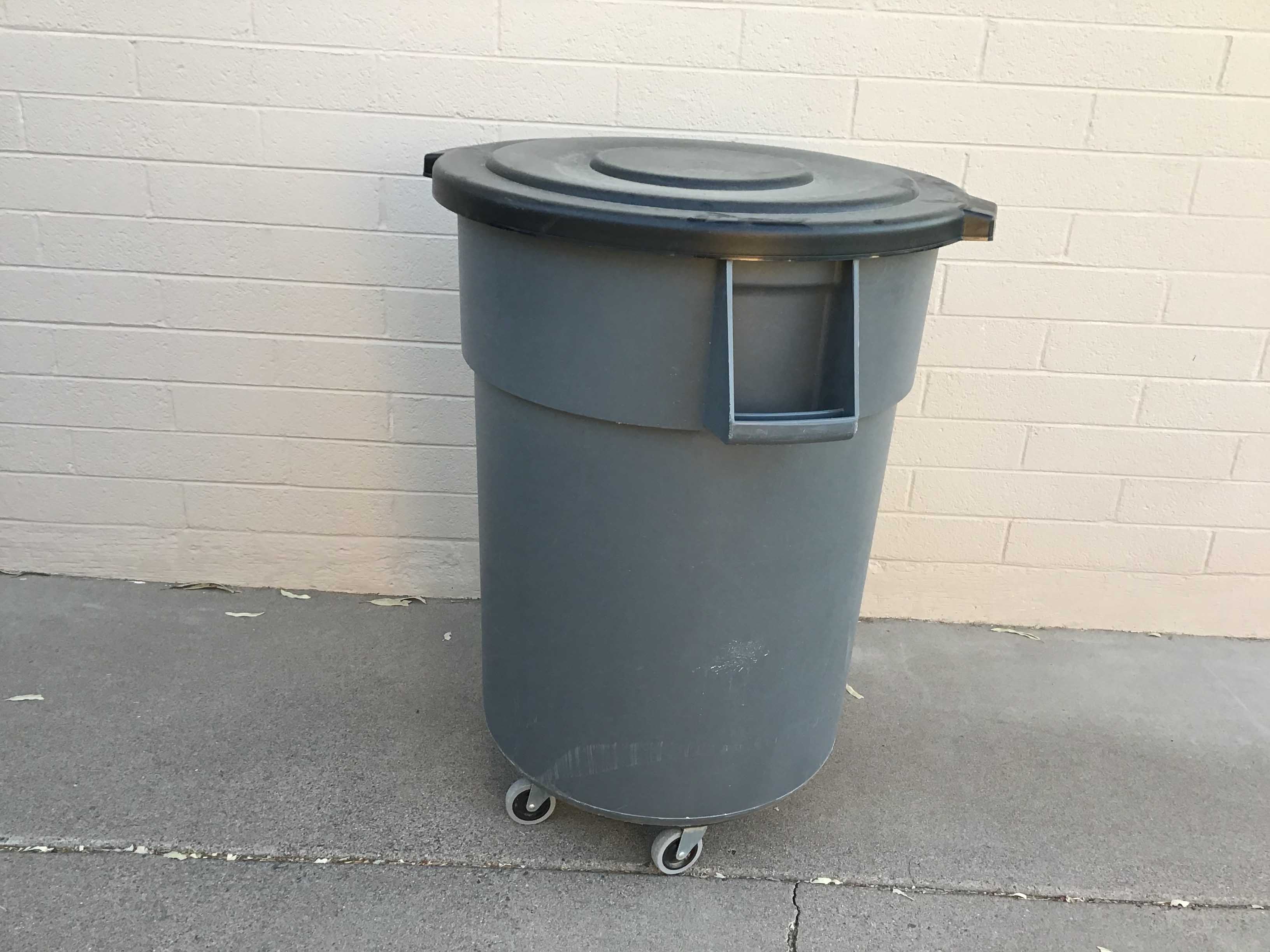 55-gallon trash can on wheels