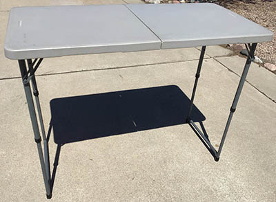 4 foot rectangle tables (adjustable heights)