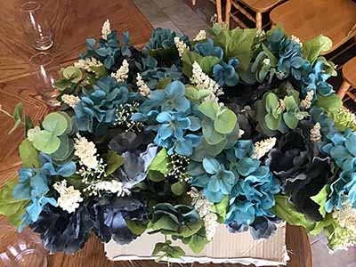 box of plastic/silk flowers