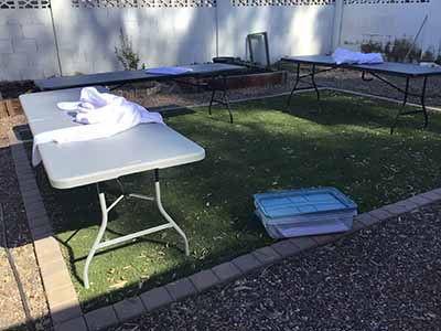 60 inch x 126 inch white rectangle tablecloths pulled directly from storage tote and put onto eight-foot rectangle tables