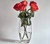 centerpiece   glass vase with red silk roses